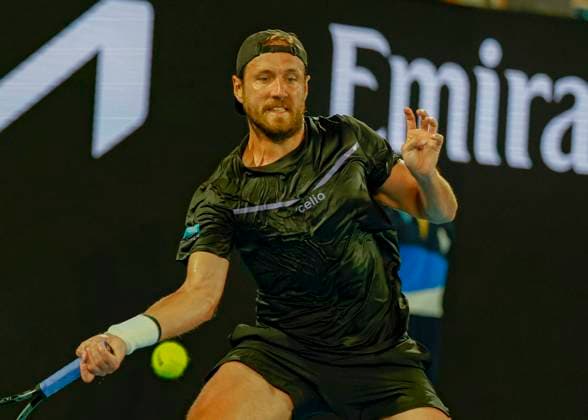 (250112) -- MELBOURNE, Jan. 12, 2025 -- Lucas Pouille hits a return during the men s singles first round match between Alexander Zverev of Germany and Lucas Pouille of France at Australian Open tennis tournament in Melbourne, Australia, Jan. 12, 2025. (Photo by Chu Chen Xinhua) (SP)AUSTRALIA-MELBOURNE-TENNIS-AUSTRALIAN OPEN-DAY 1 ZhangxJianhua 