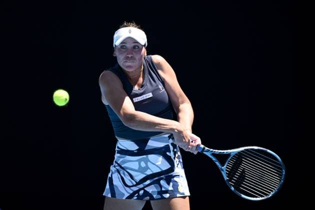 TENNIS AUSTRALIAN OPEN, Sofia Kenin of USA returns in action during her round 1 match against Coco Gauff of USA during the 2025 Australian Open at Melbourne Park in Melbourne, Monday, January 13, 2025. ( NO ARCHIVING, EDITORIAL USE ONLY, NO USE IN BOOKS WITHOUT CONSENT MELBOURNE VICTORIA AUSTRALIA  Copyright: xJOELxCARRETTx 20250113122657524832