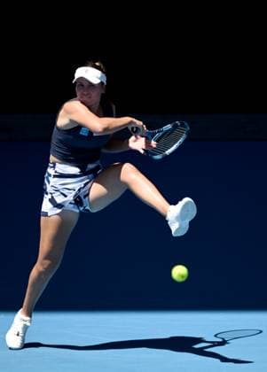 TENNIS AUSTRALIAN OPEN, Sofia Kenin of USA returns during her round 1 match against Coco Gauff of USA during the 2025 Australian Open at Melbourne Park in Melbourne, Monday, January 13, 2025. ( NO ARCHIVING, EDITORIAL USE ONLY, NO USE IN BOOKS WITHOUT CONSENT MELBOURNE VICTORIA AUSTRALIA  Copyright: xJOELxCARRETTx 20250113117445261272