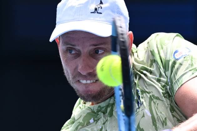 TENNIS AUSTRALIAN OPEN, James Duckworth of Australia returns during his round 1 match against Dominic Stricker of Switzerland during the 2025 Australian Open at Melbourne Park in Melbourne, Monday, January 13, 2025. ( NO ARCHIVING, EDITORIAL USE ONLY, NO USE IN BOOKS WITHOUT CONSENT MELBOURNE VICTORIA AUSTRALIA  Copyright: xJOELxCARRETTx 20250113126173884316