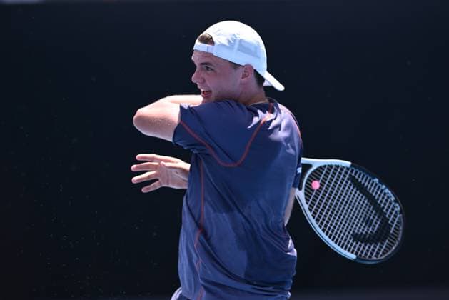 TENNIS AUSTRALIAN OPEN, Dominic Stricker of Switzerland in action during his round 1 match against James Duckworth of Australia during the 2025 Australian Open at Melbourne Park in Melbourne, Monday, January 13, 2025. ( NO ARCHIVING, EDITORIAL USE ONLY, NO USE IN BOOKS WITHOUT CONSENT MELBOURNE VICTORIA AUSTRALIA  Copyright: xJOELxCARRETTx 20250113149732781430