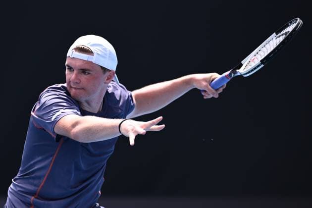TENNIS AUSTRALIAN OPEN, Dominic Stricker of Switzerland in action during his round 1 match against James Duckworth of Australia during the 2025 Australian Open at Melbourne Park in Melbourne, Monday, January 13, 2025. ( NO ARCHIVING, EDITORIAL USE ONLY, NO USE IN BOOKS WITHOUT CONSENT MELBOURNE VICTORIA AUSTRALIA  Copyright: xJOELxCARRETTx 20250113130841231658