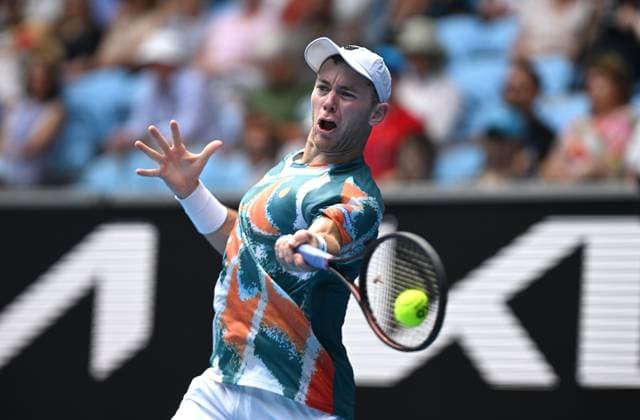 TENNIS AUSTRALIAN OPEN, Dominik Koepfer of Germany returns during his round 1 match against Jordan Thompson of Australia during the 2025 Australian Open at Melbourne Park in Melbourne, Monday, January 13, 2025. ( NO ARCHIVING, EDITORIAL USE ONLY, NO USE IN BOOKS WITHOUT CONSENT MELBOURNE VICTORIA AUSTRALIA  Copyright: xLUKASxCOCHx 20250113150025368678