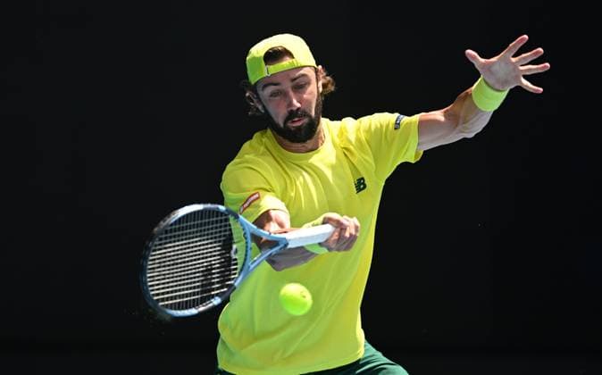 TENNIS AUSTRALIAN OPEN, Jordan Thompson of Australia returns during his round 1 match against Dominik Koepfer of Germany during the 2025 Australian Open at Melbourne Park in Melbourne, Monday, January 13, 2025. ( NO ARCHIVING, EDITORIAL USE ONLY, NO USE IN BOOKS WITHOUT CONSENT MELBOURNE VICTORIA AUSTRALIA  Copyright: xLUKASxCOCHx 20250113123118417217