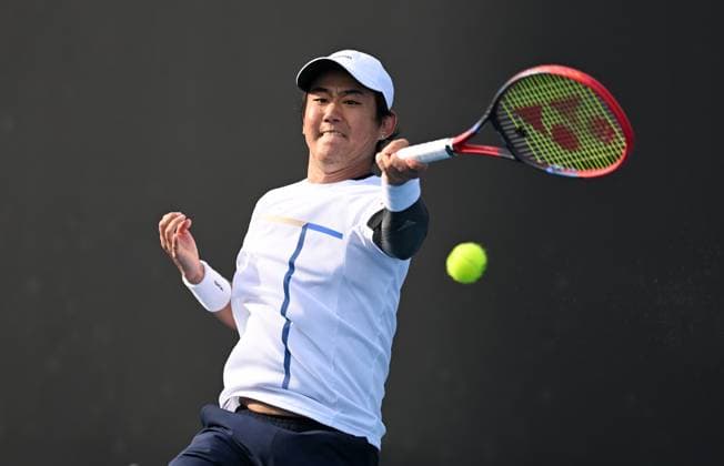 TENNIS AUSTRALIAN OPEN, Yoshihito Nishioka of Japan during his round 1 match against Aziz Dougaz of Tunisia during the 2025 Australian Open at Melbourne Park in Melbourne, Monday, January 13, 2025. ( NO ARCHIVING, EDITORIAL USE ONLY, NO USE IN BOOKS WITHOUT CONSENT MELBOURNE VICTORIA AUSTRALIA  Copyright: xLUKASxCOCHx 20250113187682100417