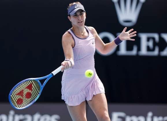 (250113) -- MELBOURNE, Jan. 13, 2025 -- Belinda Bencic hits a return during the women s singles first round match between Belinda Bencic of Switzerland and Jelena Ostapenko of Latvia at Australian Open tennis tournament in Melbourne, Australia, Jan. 13, 2025. ) (SP)AUSTRALIA-MELBOURNE-TENNIS-AUSTRALIAN OPEN-DAY 2 MaxPing 