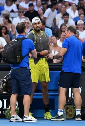TENNIS AUSTRALIAN OPEN, Nick Kyrgios of Australia sees medical staff during his round 1 match against Jacob Fearnley of Great Britain during the 2025 Australian Open at Melbourne Park in Melbourne, Monday, January 13, 2025. ( NO ARCHIVING, EDITORIAL USE ONLY, NO USE IN BOOKS WITHOUT CONSENT MELBOURNE VICTORIA AUSTRALIA  Copyright: xJAMESxROSSx 20250113154787899550