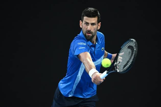 TENNIS AUSTRALIAN OPEN, Novak Djokovic of Serbia returns during his round 1 match against Nishesh Basavareddy of USA during the 2025 Australian Open at Melbourne Park in Melbourne, Monday, January 13, 2025. ( NO ARCHIVING, EDITORIAL USE ONLY, NO USE IN BOOKS WITHOUT CONSENT MELBOURNE VICTORIA AUSTRALIA  Copyright: xJOELxCARRETTx 20250113133947129280