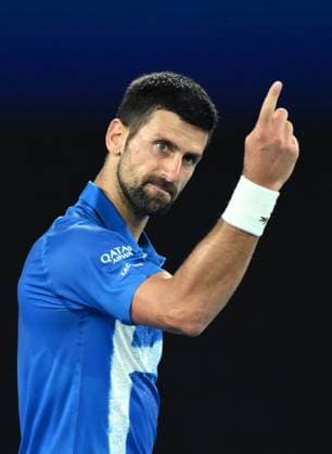 Sport Bilder des Tages TENNIS AUSTRALIAN OPEN, Novak Djokovic of Serbia reacts during his round 1 match against Nishesh Basavareddy of USA during the 2025 Australian Open at Melbourne Park in Melbourne, Monday, January 13, 2025. ( NO ARCHIVING, EDITORIAL USE ONLY, NO USE IN BOOKS WITHOUT CONSENT MELBOURNE VICTORIA AUSTRALIA  Copyright: xJOELxCARRETTx 20250113154739758048