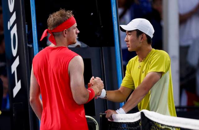 (250113) -- MELBOURNE, Jan. 13, 2025 -- Shang Juncheng (R) of China shakes hands with Davidovich Fokina of Spain after the men s singles 1st round match between Shang Juncheng of China and Davidovich Fokina of Spain at Australian Open tennis tournament in Melbourne, Australia, Jan. 13, 2025. ) (SP)AUSTRALIA-MELBOURNE-TENNIS-AUSTRALIAN OPEN-DAY 2 MaxPing 