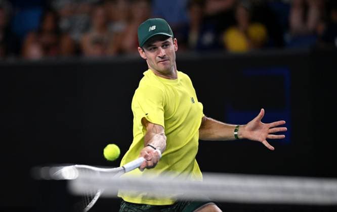 TENNIS AUSTRALIAN OPEN, Tommy Paul of USA returns during his round 1 match against Christopher O Connell of Australia during the 2025 Australian Open at Melbourne Park in Melbourne, Monday, January 13, 2025. ( NO ARCHIVING, EDITORIAL USE ONLY, NO USE IN BOOKS WITHOUT CONSENT MELBOURNE VICTORIA AUSTRALIA  Copyright: xJAMESxROSSx 20250114163988464650