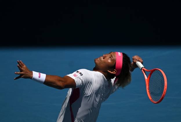 TENNIS AUSTRALIAN OPEN, Zhang Zhizhen of China prepares to serve during his round 1 match against Holger Rune of Denmark during the 2025 Australian Open at Melbourne Park in Melbourne, Tuesday, January 14, 2025. ( NO ARCHIVING, EDITORIAL USE ONLY, NO USE IN BOOKS WITHOUT CONSENT MELBOURNE VICTORIA AUSTRALIA  Copyright: xLUKASxCOCHx 20250114136213412475