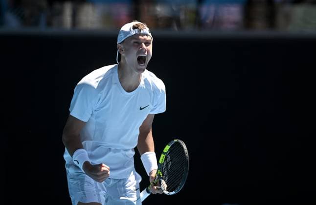 TENNIS AUSTRALIAN OPEN, Holger Rune of Denmark reacts after winning his round 1 match against Zhang Zhizhen of China during the 2025 Australian Open at Melbourne Park in Melbourne, Tuesday, January 14, 2025. ( NO ARCHIVING, EDITORIAL USE ONLY, NO USE IN BOOKS WITHOUT CONSENT MELBOURNE VICTORIA AUSTRALIA  Copyright: xLUKASxCOCHx 20250114194126432550