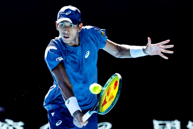 MELBOURNE, VIC - JANUARY 14: Kasidit Samrej of Thailand in action during Round 1 of the 2025 Australian Open on January 14 2025, at Melbourne Park in Melbourne, Australia. (Photo by Jason Heidrich Icon Sportswire) TENNIS: JAN 14 Australian Open EDITORIAL USE ONLY Icon250114145