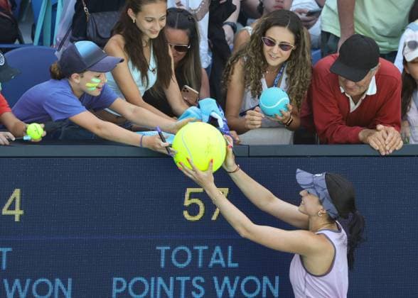 Eva Lys signs autographs for spectators, fans after her victory, Australian Open 2024, Melbourne Park, Melbourne, Victoria, Australia Copyright: xJuergenxHasenkopfx