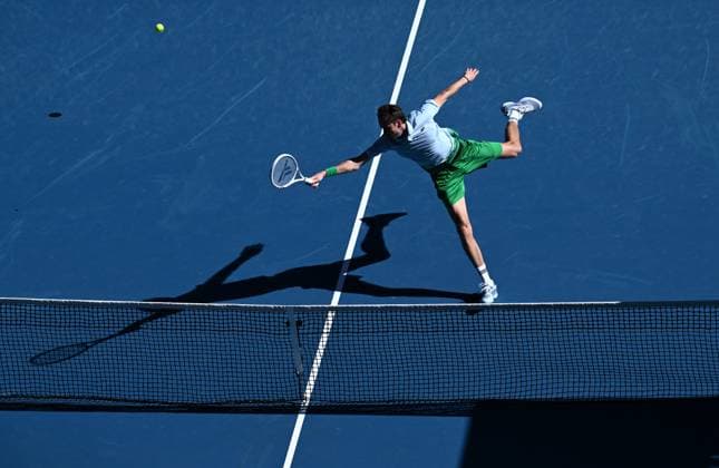 Sport Bilder des Tages TENNIS AUSTRALIAN OPEN, Daniil Medvedev of Russia in action during his round 1 match against Kasidit Samrej of Thailand during the 2025 Australian Open at Melbourne Park in Melbourne, Tuesday, January 14, 2025. ( NO ARCHIVING, EDITORIAL USE ONLY, NO USE IN BOOKS WITHOUT CONSENT MELBOURNE VICTORIA AUSTRALIA  Copyright: xJOELxCARRETTx 20250114198401436696