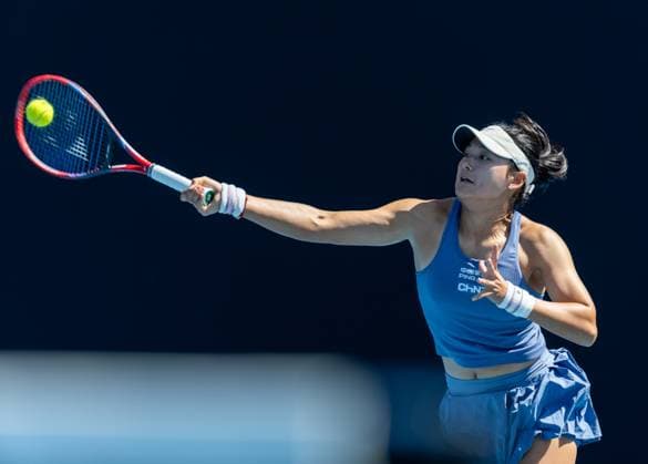 (250114) -- MELBOURNE, Jan. 14, 2025 -- Wang Yafan hits a return during the women s singles first round match between Wang Yafan of China and Anna Bondar of Hungary at Australian Open tennis tournament in Melbourne, Australia, Jan. 14, 2025. (Photo by Xinhua) (SP)AUSTRALIA-MELBOURNE-TENNIS-AUSTRALIAN OPEN-DAY 3 HuxJingchen 