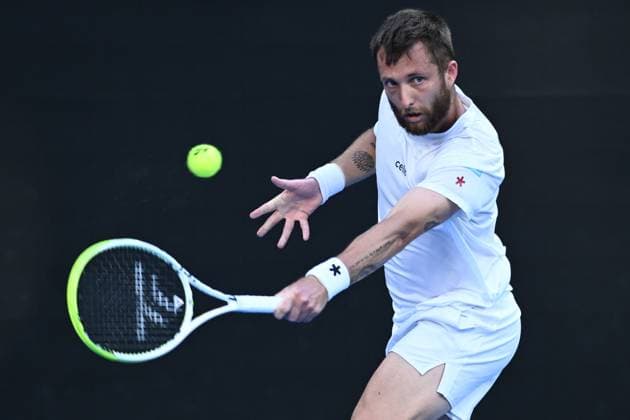 TENNIS AUSTRALIAN OPEN, Corentin Moutet of France returns during his round 1 match against Alexei Popyrin of Australia during the 2025 Australian Open at Melbourne Park in Melbourne, Tuesday, January 14, 2025. ( NO ARCHIVING, EDITORIAL USE ONLY, NO USE IN BOOKS WITHOUT CONSENT MELBOURNE VICTORIA AUSTRALIA  Copyright: xJOELxCARRETTx 20250114146457755740