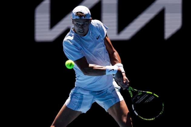 (250114) -- MELBOURNE, Jan. 14, 2025 -- Holger Rune hits a return during the men s singles first round match between Zhang Zhizhen of China and Holger Rune of Denmark at Australian Open tennis tournament in Melbourne, Australia, Jan. 14, 2025. ) (SP)AUSTRALIA-MELBOURNE-TENNIS-AUSTRALIAN OPEN-DAY 3 MaxPing 