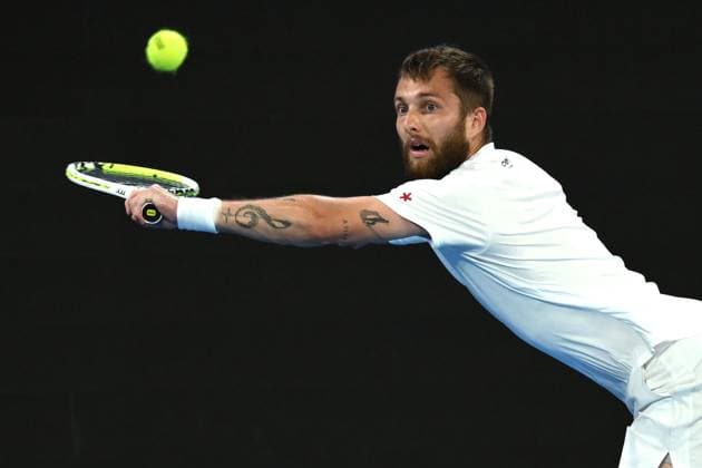 TENNIS AUSTRALIAN OPEN, Corentin Moutet of France returns during his round 1 match against Alexei Popyrin of Australia during the 2025 Australian Open at Melbourne Park in Melbourne, Tuesday, January 14, 2025. ( NO ARCHIVING, EDITORIAL USE ONLY, NO USE IN BOOKS WITHOUT CONSENT MELBOURNE VICTORIA AUSTRALIA  Copyright: xJOELxCARRETTx 20250114151603400109