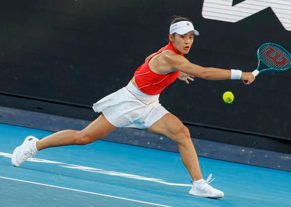 (250114) -- MELBOURNE, Jan. 14, 2025 -- Wei Sijia hits a return during the women s singles first round match between Wei Sijia of China and Jasmine Paolini of Italy at Australian Open tennis tournament in Melbourne, Australia, Jan. 14, 2025. (Photo by Xinhua) (SP)AUSTRALIA-MELBOURNE-TENNIS-AUSTRALIAN OPEN ChuxChen 
