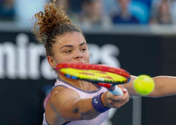 (250114) -- MELBOURNE, Jan. 14, 2025 -- Jasmine Paolini hits a return during the women s singles first round match between Wei Sijia of China and Jasmine Paolini of Italy at Australian Open tennis tournament in Melbourne, Australia, Jan. 14, 2025. (Photo by Xinhua) (SP)AUSTRALIA-MELBOURNE-TENNIS-AUSTRALIAN OPEN ChuxChen 