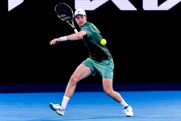 MELBOURNE, VIC - JANUARY 14: Botic van de Zandschulp of the Netherlands in action during Round 1 of the 2025 Australian Open on January 14 2025, at Melbourne Park in Melbourne, Australia. (Photo by Jason Heidrich Icon Sportswire) TENNIS: JAN 14 Australian Open EDITORIAL USE ONLY Icon250114215