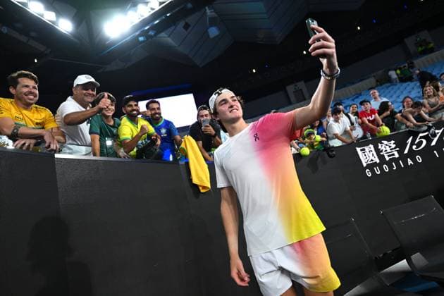 TENNIS AUSTRALIAN OPEN, Joao Fonseca of Brazil takes selfies with fans after winning his round 1 match against Andrey Rublev of Russia during the 2025 Australian Open at Melbourne Park in Melbourne, Tuesday, January 14, 2025. ( NO ARCHIVING, EDITORIAL USE ONLY, NO USE IN BOOKS WITHOUT CONSENT MELBOURNE VICTORIA AUSTRALIA  Copyright: xLUKASxCOCHx 20250114159758681671