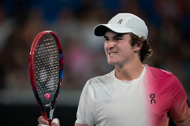 (250114) -- MELBOURNE, Jan. 14, 2025 -- Joao Fonseca reacts during the men s singles first round match between Joao Fonseca of Brazil and Andrey Rublev of Russia at Australian Open tennis tournament in Melbourne, Australia, Jan. 14, 2025. ) (SP)AUSTRALIA-MELBOURNE-TENNIS-AUSTRALIAN OPEN LuixSiuxWai 