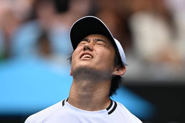 TENNIS AUSTRALIAN OPEN, Yoshihito Nishioka of Japan reacts during his round 2 match against Carlos Alcaraz of Spain during the 2025 Australian Open at Melbourne Park in Melbourne, Wednesday, January 15, 2025. ( NO ARCHIVING, EDITORIAL USE ONLY, NO USE IN BOOKS WITHOUT CONSENT MELBOURNE VICTORIA AUSTRALIA  Copyright: xLUKASxCOCHx 20250115138267742693
