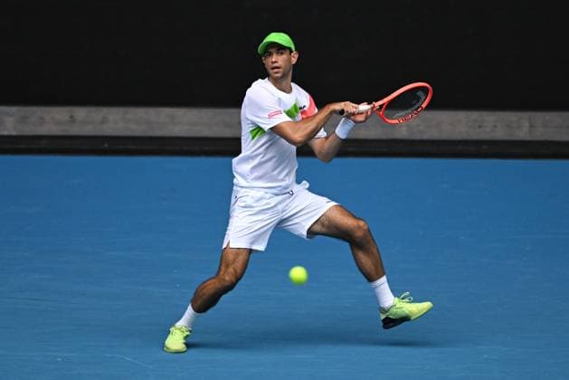 TENNIS AUSTRALIAN OPEN, Nuno Borges of Portugal returns during his round 2 match against Jordan Thomspon of Australia during the 2025 Australian Open at Melbourne Park in Melbourne, Wednesday, January 15, 2025. ( NO ARCHIVING, EDITORIAL USE ONLY, NO USE IN BOOKS WITHOUT CONSENT MELBOURNE VICTORIA AUSTRALIA  Copyright: xJAMESxROSSx 20250115111317772911
