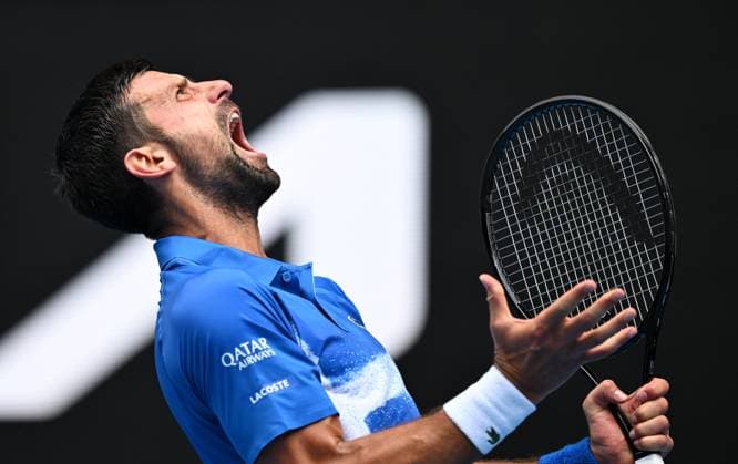 Sport Bilder des Tages TENNIS AUSTRALIAN OPEN, Novak Djokovic of Serbia reacts during his round 2 match against Jaime Faria of Portugal during the 2025 Australian Open at Melbourne Park in Melbourne, Wednesday, January 15, 2025. ( NO ARCHIVING, EDITORIAL USE ONLY, NO USE IN BOOKS WITHOUT CONSENT MELBOURNE VICTORIA AUSTRALIA  Copyright: xLUKASxCOCHx 20250115158829499127