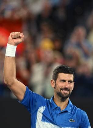 TENNIS AUSTRALIAN OPEN, Novak Djokovic of Serbia celebrates after winning his round 2 match against Jaime Faria of Portugal during the 2025 Australian Open at Melbourne Park in Melbourne, Wednesday, January 15, 2025. ( NO ARCHIVING, EDITORIAL USE ONLY, NO USE IN BOOKS WITHOUT CONSENT MELBOURNE VICTORIA AUSTRALIA  Copyright: xLUKASxCOCHx 20250115120046103759