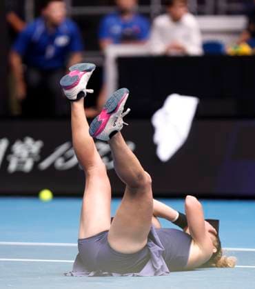 (250115) -- MELBOURNE, Jan. 15, 2025 -- Laura Siegemund celebrates after winning the women s singles 2nd round match between Zheng Qinwen of China and Laura Siegemund of Germany at Australian Open tennis tournament in Melbourne, Australia, Jan. 15, 2025. ) (SP)AUSTRALIA-MELBOURNE-TENNIS-AUSTRALIAN OPEN-DAY 4 MaxPing 