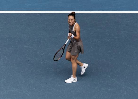 (250115) -- MELBOURNE, Jan. 15, 2025 -- Zheng Qinwen reacts during the women s singles 2nd round match between Zheng Qinwen of China and Laura Siegemund of Germany at Australian Open tennis tournament in Melbourne, Australia, Jan. 15, 2025. (Photo by Xinhua) (SP)AUSTRALIA-MELBOURNE-TENNIS-AUSTRALIAN OPEN-DAY 4 HuxJingchen 