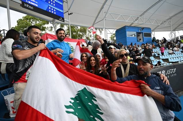 TENNIS AUSTRALIAN OPEN, Lebanese fans wait for a rain-delayed round 2 match between Hady Habib of Lebanon and Ugo Humbert of France during the 2025 Australian Open at Melbourne Park in Melbourne, Wednesday, January 15, 2025. ( NO ARCHIVING, EDITORIAL USE ONLY, NO USE IN BOOKS WITHOUT CONSENT MELBOURNE VICTORIA AUSTRALIA  Copyright: xLUKASxCOCHx 20250115131420943127