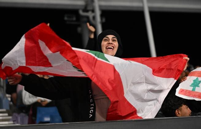 TENNIS AUSTRALIAN OPEN, Lebanese fans look on as Hady Habib of Lebanon competes during his round 2 match against Ugo Humbert of France during the 2025 Australian Open at Melbourne Park in Melbourne, Wednesday, January 15, 2025. ( NO ARCHIVING, EDITORIAL USE ONLY, NO USE IN BOOKS WITHOUT CONSENT MELBOURNE VICTORIA AUSTRALIA  Copyright: xLUKASxCOCHx 20250115139810945496