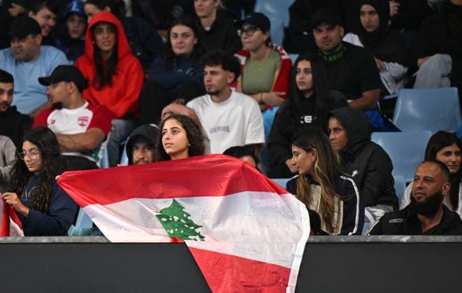 TENNIS AUSTRALIAN OPEN, Lebanese fans look on as Hady Habib of Lebanon competes during his round 2 match against Ugo Humbert of France during the 2025 Australian Open at Melbourne Park in Melbourne, Wednesday, January 15, 2025. ( NO ARCHIVING, EDITORIAL USE ONLY, NO USE IN BOOKS WITHOUT CONSENT MELBOURNE VICTORIA AUSTRALIA  Copyright: xLUKASxCOCHx 20250115147348305680