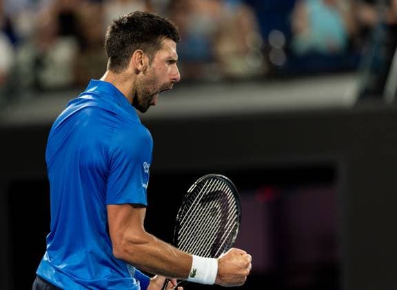 (250115) -- MELBOURNE, Jan. 15, 2025 -- Novak Djokovic celebrates scoring during the men s singles second round match between Novak Djokovic of Serbia and Jaime Faria of Portugal at Australian Open tennis tournament in Melbourne, Australia, Jan. 15, 2025. (Photo by Xinhua) (SP)AUSTRALIA-MELBOURNE-TENNIS-AUSTRALIAN OPEN HuxJingchen 