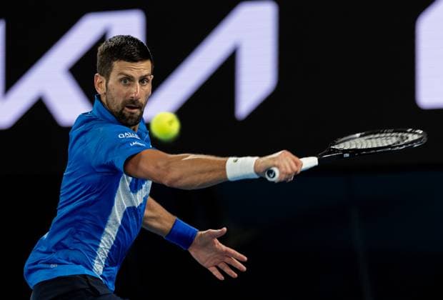 (250115) -- MELBOURNE, Jan. 15, 2025 -- Novak Djokovic hits a return during the men s singles second round match between Novak Djokovic of Serbia and Jaime Faria of Portugal at Australian Open tennis tournament in Melbourne, Australia, Jan. 15, 2025. (Photo by Xinhua) (SP)AUSTRALIA-MELBOURNE-TENNIS-AUSTRALIAN OPEN HuxJingchen 