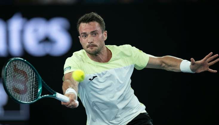 (250115) -- MELBOURNE, Jan. 15, 2025 -- Pedro Martinez hits a return during the men s singles second round match between Alexander Zverev of Germany and Pedro Martinez of Spain at Australian Open tennis tournament in Melbourne, Australia, Jan. 15, 2025. ) (SP)AUSTRALIA-MELBOURNE-TENNIS-AUSTRALIAN OPEN LuixSiuxWai 