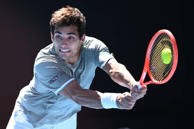 TENNIS AUSTRALIAN OPEN, Cristian Garin of Chile returns during his round 2 match against Taylor Fritz of USA during the 2025 Australian Open at Melbourne Park in Melbourne, Thursday, January 16, 2025. ( NO ARCHIVING, EDITORIAL USE ONLY, NO USE IN BOOKS WITHOUT CONSENT MELBOURNE VICTORIA AUSTRALIA  Copyright: xJOELxCARRETTx 20250116122875393145