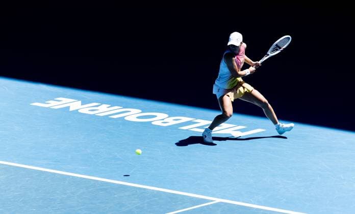 (250116) -- MELBOURNE, Jan. 16, 2025 -- Iga Swiatek hits a return during the women s singles 2nd round match between Iga Swiatek of Poland and Rebecca Sramkova of Slovakia at Australian Open tennis tournament in Melbourne, Australia, Jan. 16, 2025. (Photo by Xinhua) (SP)AUSTRALIA-MELBOURNE-TENNIS-AUSTRALIAN OPEN-DAY 5 HuxJingchen 