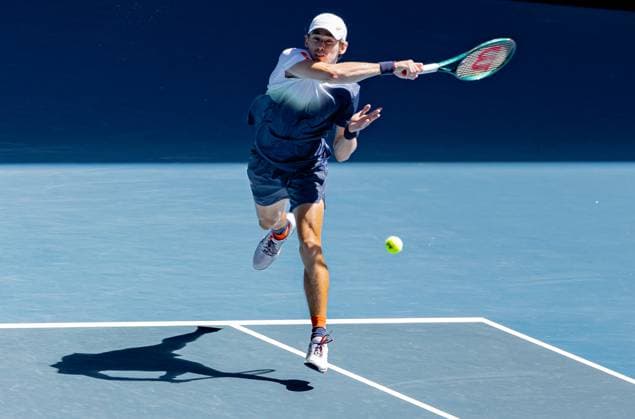 (250116) -- MELBOURNE, Jan. 16, 2025 -- Alex De Minaur hits a return during the men s singles 2nd round match between Alex De Minaur of Australia and Tristan Boyer of the United States at Australian Open tennis tournament in Melbourne, Australia, Jan. 16, 2025. (Photo by Xinhua) (SP)AUSTRALIA-MELBOURNE-TENNIS-AUSTRALIAN OPEN-DAY 5 HuxJingchen 