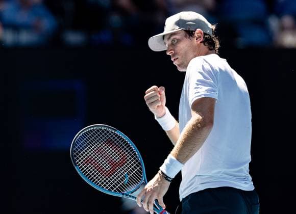 (250116) -- MELBOURNE, Jan. 16, 2025 -- Tristan Boyer celebrates scoring during the men s singles 2nd round match between Alex De Minaur of Australia and Tristan Boyer of the United States at Australian Open tennis tournament in Melbourne, Australia, Jan. 16, 2025. (Photo by Xinhua) (SP)AUSTRALIA-MELBOURNE-TENNIS-AUSTRALIAN OPEN-DAY 5 HuxJingchen 