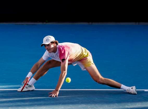 (250116) -- MELBOURNE, Jan. 16, 2025 -- Joao Fonseca hits a return during the men s singles 2nd round match between Joao Fonseca of Brazil and Lorenzo Sonego of Italy at Australian Open tennis tournament in Melbourne, Australia, Jan. 16, 2025. ) (SP)AUSTRALIA-MELBOURNE-TENNIS-AUSTRALIAN OPEN-DAY 5 MaxPing 