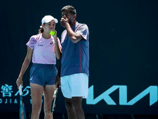 (250117) -- MELBOURNE, Jan. 17, 2025 -- Zhang Shuai (L) talks with Rohan Bopanna during the mixed doubles 1st round match between Zhang Shuai (China) Rohan Bopanna (India) and Kristina Mladenovic (France) Ivan Dodig (Croatia) at Australian Open tennis tournament in Melbourne, Australia, Jan. 17, 2025. ) (SP)AUSTRALIA-MELBOURNE-TENNIS-AUSTRALIAN OPEN-DAY 6 MaxPing 