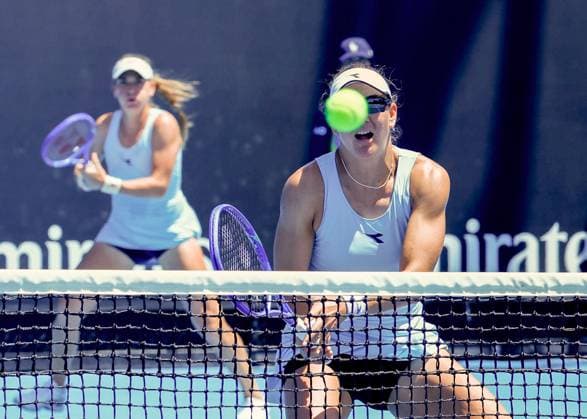 (250117) -- MELBOURNE,, Jan. 17, 2025 -- Timea Babos Nicole Melichar-Martinez (R) compete during the women s doubles second round match between Yuan Yue (China) Ekaterina Alexandrova (Russia) and Timea Babos (Hungary) Nicole Melichar-Martinez (the United States) at Australian Open tennis tournament in Melbourne, Australia, Jan. 17, 2025. (Photo by Xinhua) (SP)AUSTRALIA-MELBOURNE-TENNIS-AUSTRALIAN OPEN-DAY 6 ChuxChen 