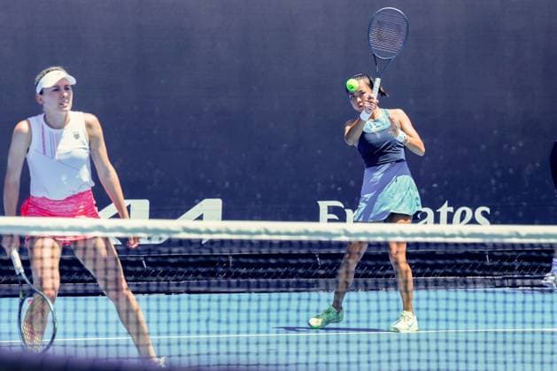 (250117) -- MELBOURNE,, Jan. 17, 2025 -- Yuan Yue (R) Ekaterina Alexandrova compete during the women s doubles second round match between Yuan Yue (China) Ekaterina Alexandrova (Russia) and Timea Babos (Hungary) Nicole Melichar-Martinez (the United States) at Australian Open tennis tournament in Melbourne, Australia, Jan. 17, 2025. (Photo by Xinhua) (SP)AUSTRALIA-MELBOURNE-TENNIS-AUSTRALIAN OPEN-DAY 6 ChuxChen 