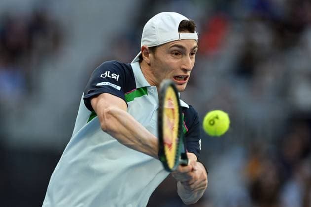 TENNIS AUSTRALIAN OPEN, Ugo Humbert of France returns during his round three match against Arthur Fils of France during the 2025 Australian Open at Melbourne Park in Melbourne, Friday, January 17, 2025. ( NO ARCHIVING, EDITORIAL USE ONLY, NO USE IN BOOKS WITHOUT CONSENT MELBOURNE VICTORIA AUSTRALIA  Copyright: xLUKASxCOCHx 20250117157228063395